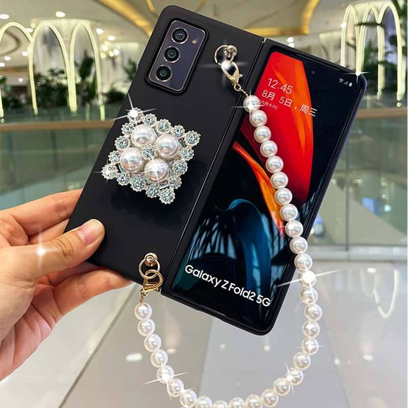 Franch StyleC Case For Samsung Galaxy Z Fold 6 5 4 3 2 5G Bling Diamond Rhinestone Stand Holder Case Cover With Pearl Hand Chain
Franch StyleC Case For Samsung Galaxy Z Fold 6 5 4 3 2 5G Bling Diamond Rhinestone Stand Holder Case Cover With Pearl Hand Chain