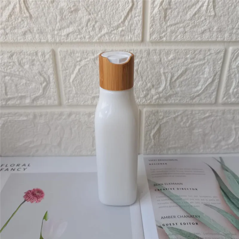 100ml White Porcelain Bottle with Bamboo Cap Make-Up Skin Care Container Luxury Cosmetic Packaging Travel Lotion Bottle
100ml White Porcelain Bottle with Bamboo Cap Make-Up Skin Care Container Luxury Cosmetic Packaging Travel Lotion Bottle