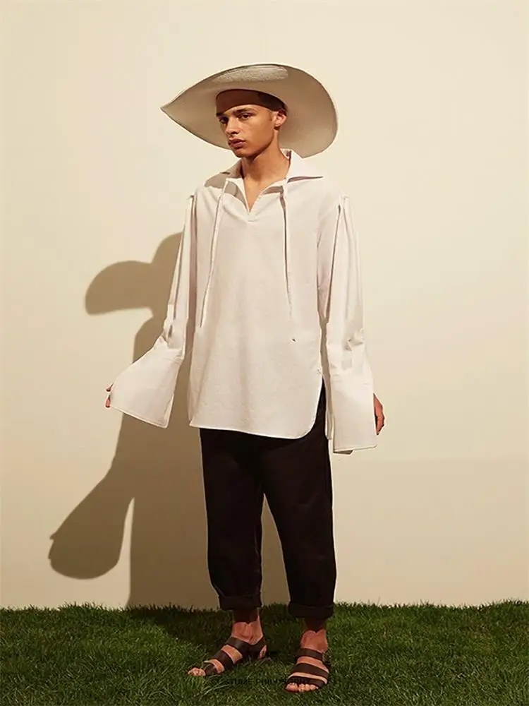 Men's new lacing personality simple men's fashion singer hair stylist stage style runway style loose casual large size shirt
Men's new lacing personality simple men's fashion singer hair stylist stage style runway style loose casual large size shirt