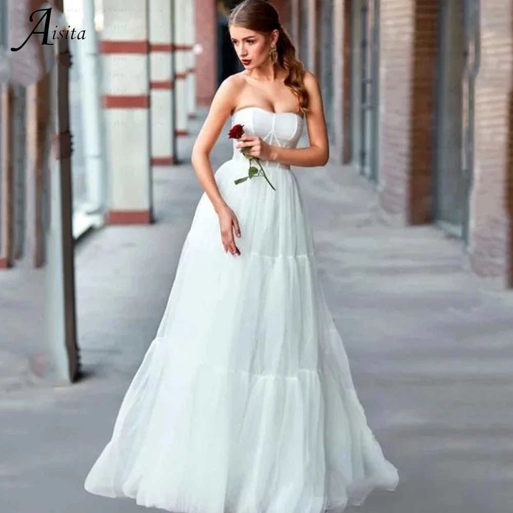 Simple Strapless Wedding Dresses Elegant Sleeveless Tulle Open Back A Line Sweep Train Bridal Gowns Robe De Mariée Custom
Simple Strapless Wedding Dresses Elegant Sleeveless Tulle Open Back A Line Sweep Train Bridal Gowns Robe De Mariée Custom