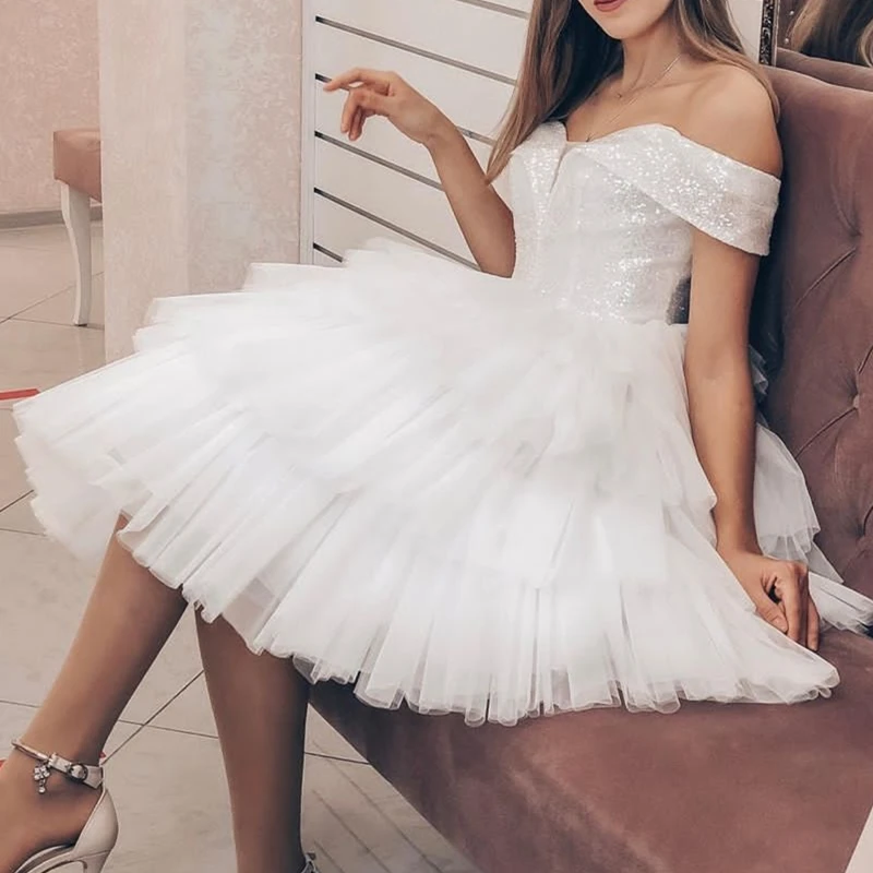 Off Shoulder Organza White Wedding Dresses Charming Short Shinny Puff Women Robe De Mariee New Organza Bridal Gowns
Off Shoulder Organza White Wedding Dresses Charming Short Shinny Puff Women Robe De Mariee New Organza Bridal Gowns