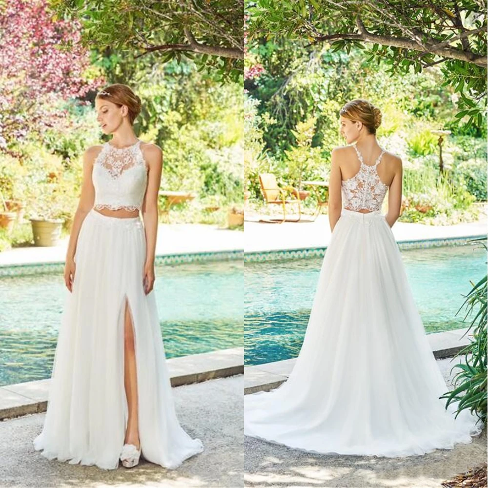 New white thigh high open Two two-piece dress applique bridal gown custom sleeveless tulle jewel beach wedding dress
New white thigh high open Two two-piece dress applique bridal gown custom sleeveless tulle jewel beach wedding dress