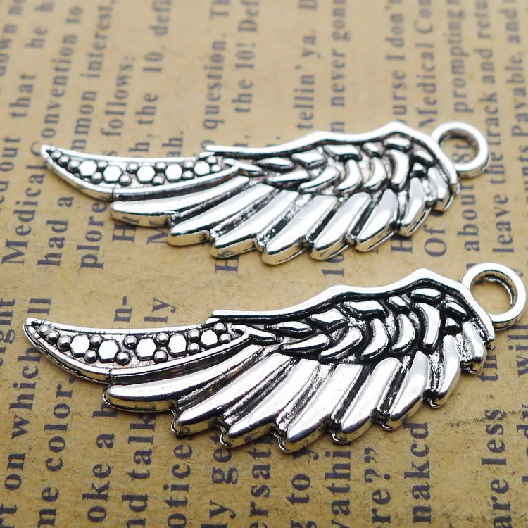 10PCS/Lot 12mm*39mm Pendant Antique Silver Color Wing Charm Handcraft For DIY Jewelry Making
10PCS/Lot 12mm*39mm Pendant Antique Silver Color Wing Charm Handcraft For DIY Jewelry Making