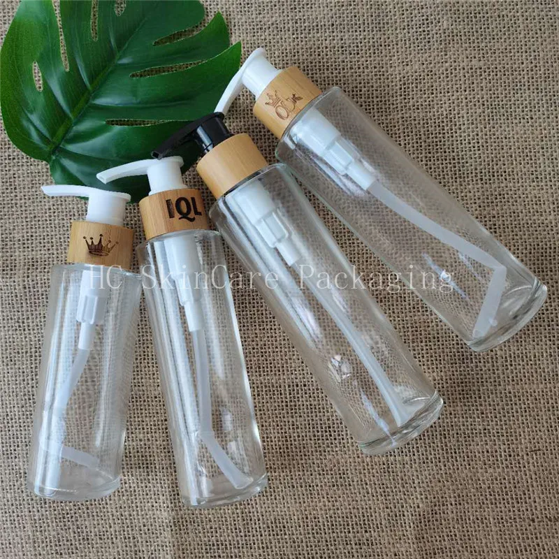 High quanlity Skin care packaging cosmetic glass bottle with bamboo wood pump lid 100ml 120ml 150ml lotion glass bottles
High quanlity Skin care packaging cosmetic glass bottle with bamboo wood pump lid 100ml 120ml 150ml lotion glass bottles