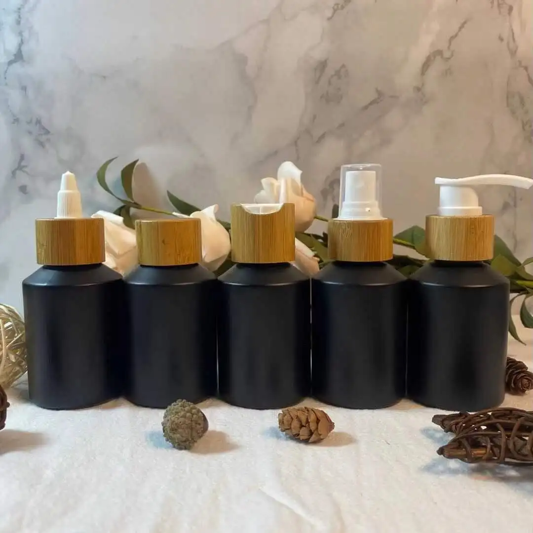 60ml 100ml Perfume Mist Spray Bottle Matte Black Refillable Cosmetic Glass Emulsion Lotion Pump Bottle With Wooden Natural Lid
60ml 100ml Perfume Mist Spray Bottle Matte Black Refillable Cosmetic Glass Emulsion Lotion Pump Bottle With Wooden Natural Lid