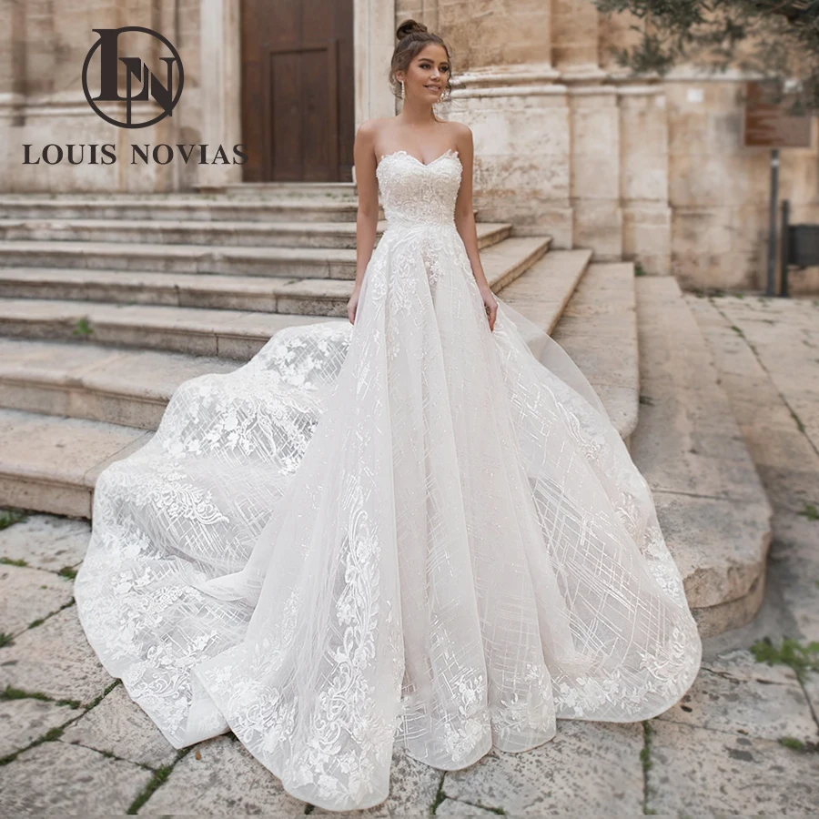 LOUIS NOVIAS Luxury Wedding Dresses For Women Sexy Strapless Appliques Bridal Gown Lace Sparkling Tulle A-Line Vestido De Novia
LOUIS NOVIAS Luxury Wedding Dresses For Women Sexy Strapless Appliques Bridal Gown Lace Sparkling Tulle A-Line Vestido De Novia