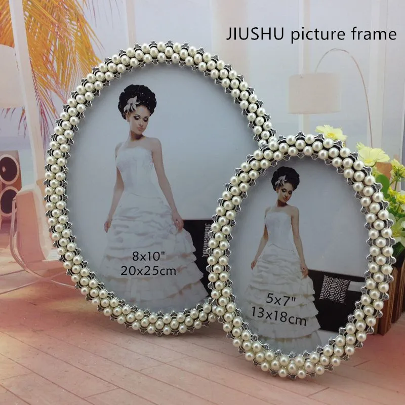 2022European style imitation pearl photo frame with diamond photo frame classical wedding gift home decoration photo frame set
2022European style imitation pearl photo frame with diamond photo frame classical wedding gift home decoration photo frame set