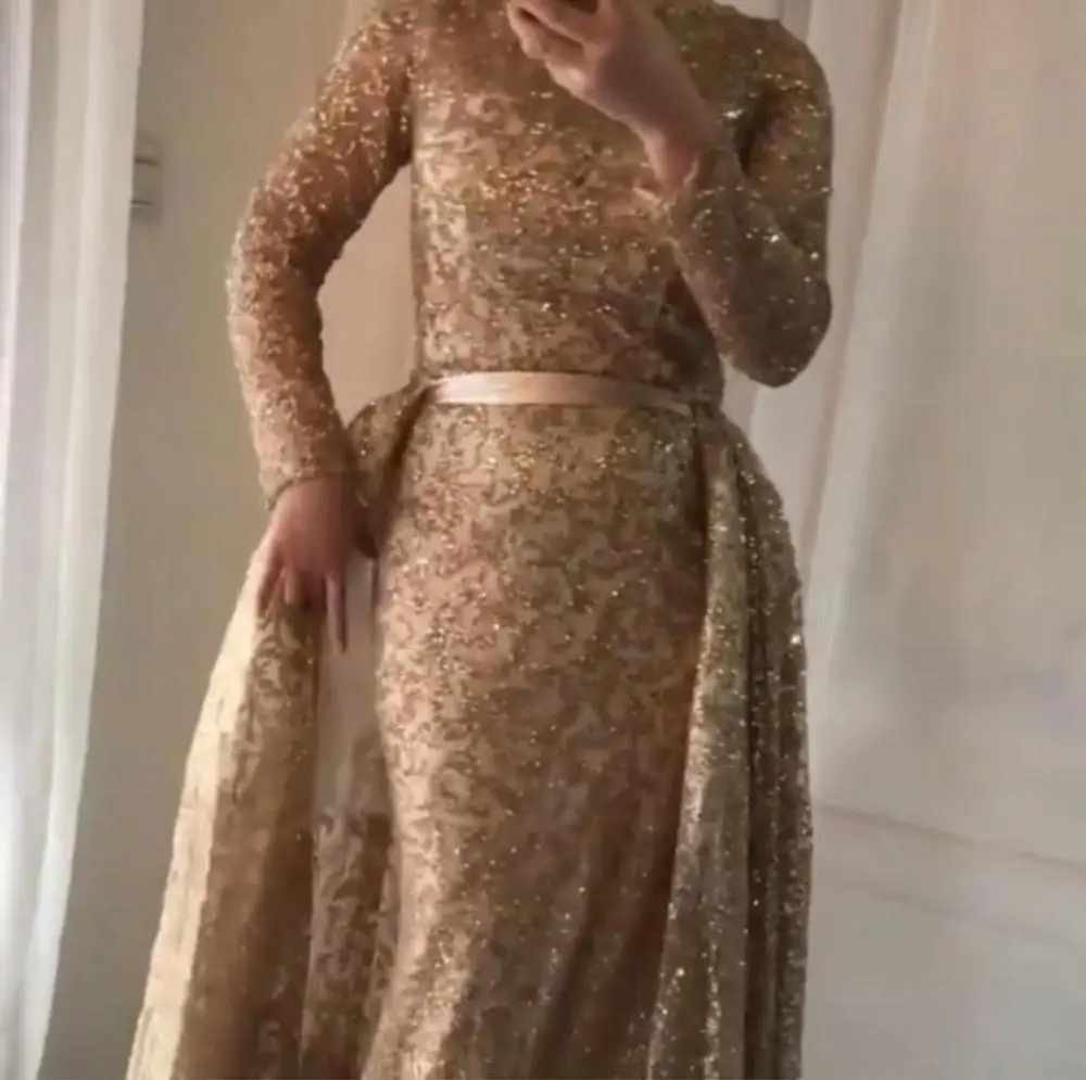 Sparkly Long Sleeves Gliter with Train Evening Gowns 2020 Dubai Fashion Mermaid Luxury Evening Dress
Sparkly Long Sleeves Gliter with Train Evening Gowns 2020 Dubai Fashion Mermaid Luxury Evening Dress