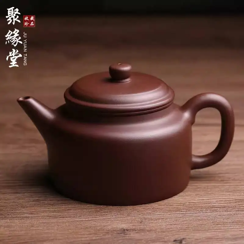 Чайник из исинской оригинальной пурпурной глины Jianliu Dezhong, ручной работы, мастерской работы, из натурального камня, одиночный, для набора для чаепития Кунг-фу, чайная утварь
Чайник из исинской оригинальной пурпурной глины Jianliu Dezhong, ручной работы, мастерской работы, из натурального камня, одиночный, для набора для чаепития Кунг-фу, чайная утварь