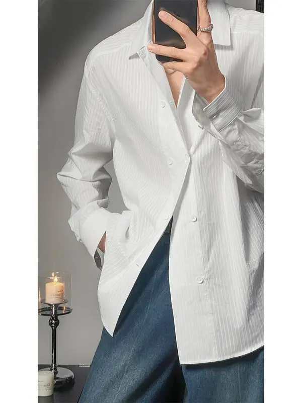 Рубашка с длинными рукавами и двойной пуговицей в вертикальную полоску, мужская корейская версия, универсальная однотонная рубашка темперамента
Рубашка с длинными рукавами и двойной пуговицей в вертикальную полоску, мужская корейская версия, универсальная однотонная рубашка темперамента