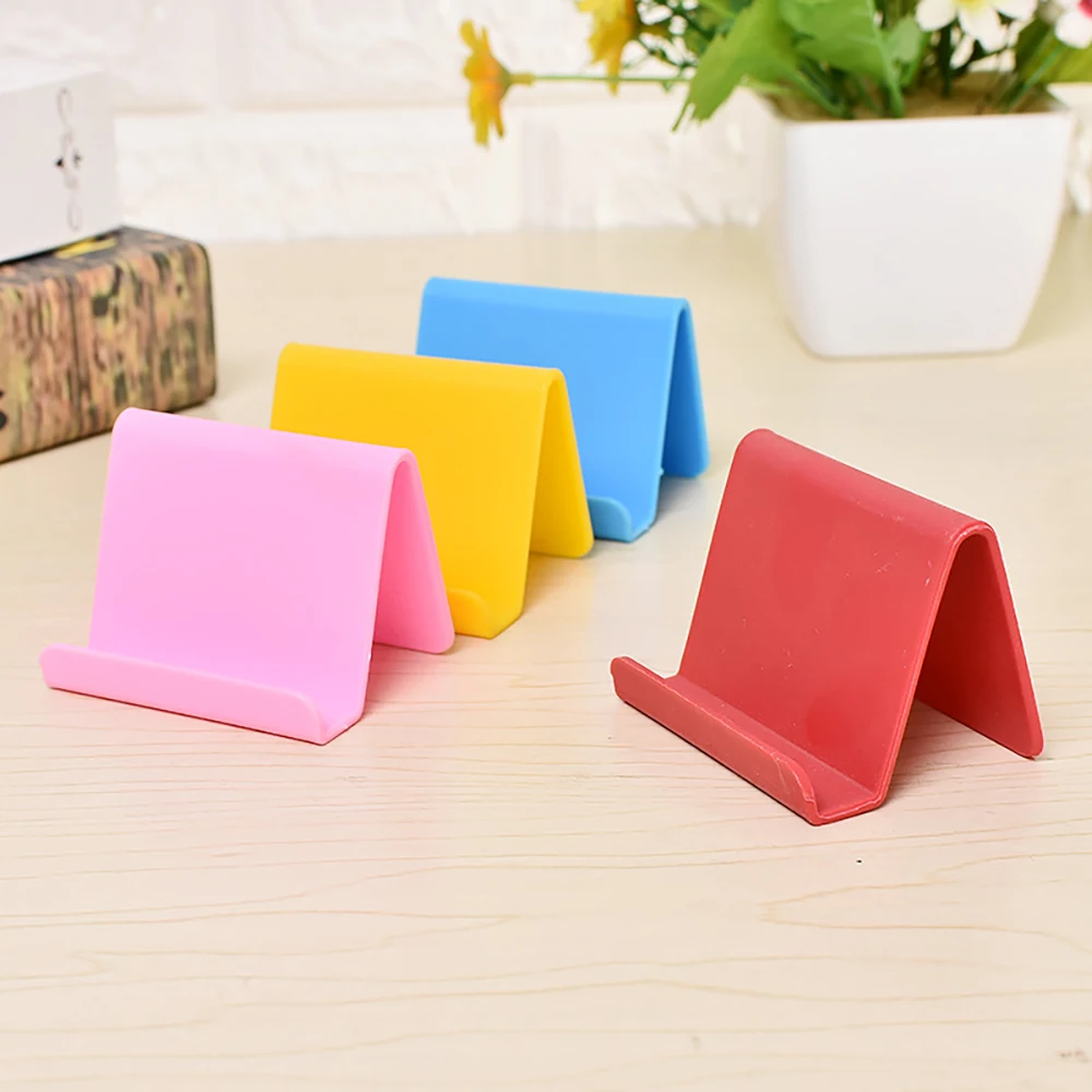 Mini Portable Kitchen Phone Holder Universal Movable Mini Lazy Bracket Fashion Convenience Cellphone Mount Plastic Stand
Mini Portable Kitchen Phone Holder Universal Movable Mini Lazy Bracket Fashion Convenience Cellphone Mount Plastic Stand