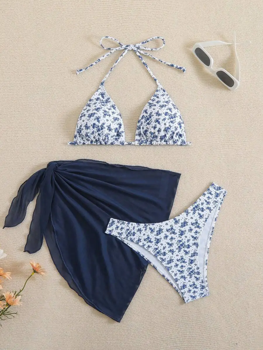 Women Floral Print Halter Triangle Bikini Set With Solid Wrap Skirt
Women Floral Print Halter Triangle Bikini Set With Solid Wrap Skirt