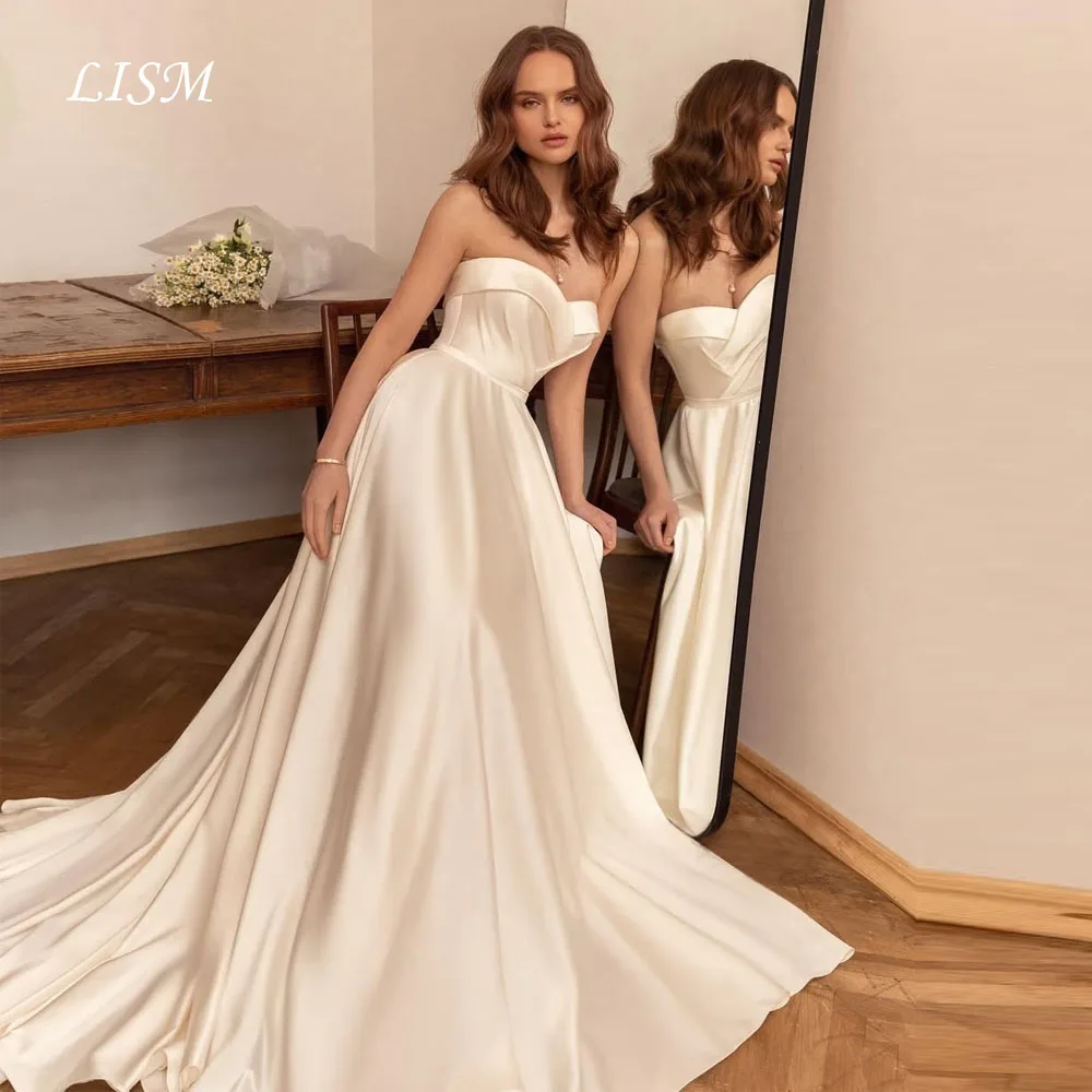 Свадебные платья LISM из атласного шелка на заказ, простые, без рукавов, с вырезом «сердечко», А-силуэт, пляжное свадебное платье, vestidos de novia
Свадебные платья LISM из атласного шелка на заказ, простые, без рукавов, с вырезом «сердечко», А-силуэт, пляжное свадебное платье, vestidos de novia