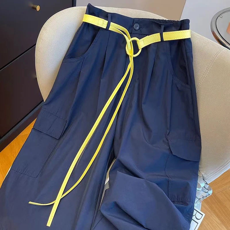 Широкие свободные универсальные брюки в японском стиле для женщин осенью 2023 года, новые однотонные повседневные трендовые брюки-карго с поясом
Широкие свободные универсальные брюки в японском стиле для женщин осенью 2023 года, новые однотонные повседневные трендовые брюки-карго с поясом