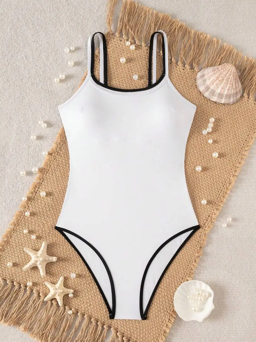 Womens White One-Piece Swimsuit With Black Trim Strap
Womens White One-Piece Swimsuit With Black Trim Strap