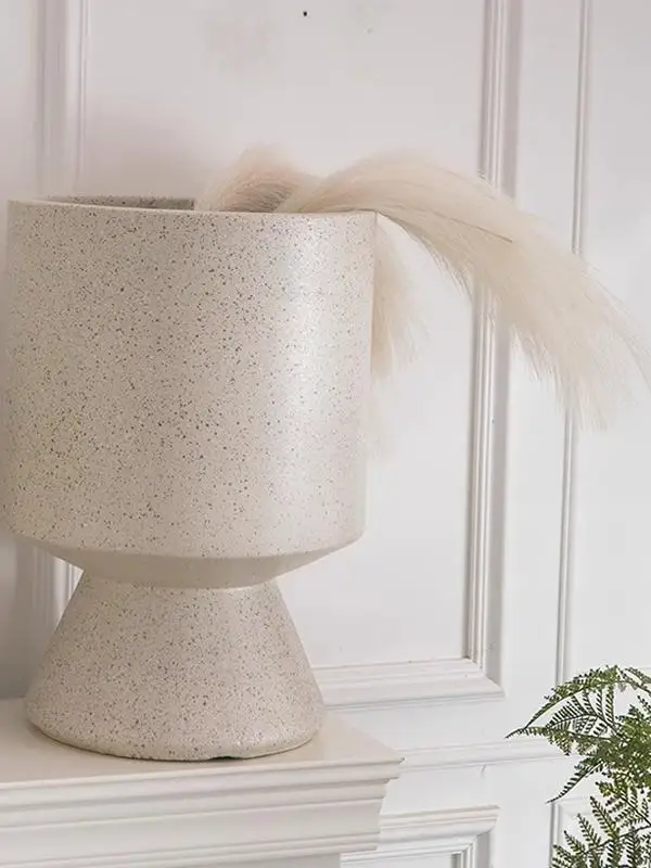 Nordic Sle Modern Creative Tall Mug Geometric Flower Pots Magnesium Clay Floor Standing Home Decor Bla And White Soft Fur... 
Nordic Sle Modern Creative Tall Mug Geometric Flower Pots Magnesium Clay Floor Standing Home Decor Bla And White Soft Fur...