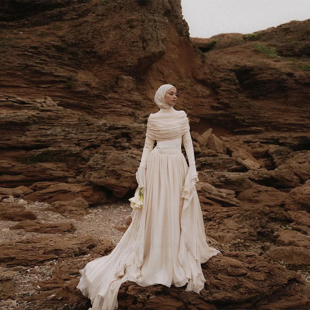 Roseann Bohemian Wedding Dress Muslim Ruffle Sleeve Chiffon Sweep Train with Draped Shawl Customized vestidos de novia sencillos
Roseann Bohemian Wedding Dress Muslim Ruffle Sleeve Chiffon Sweep Train with Draped Shawl Customized vestidos de novia sencillos