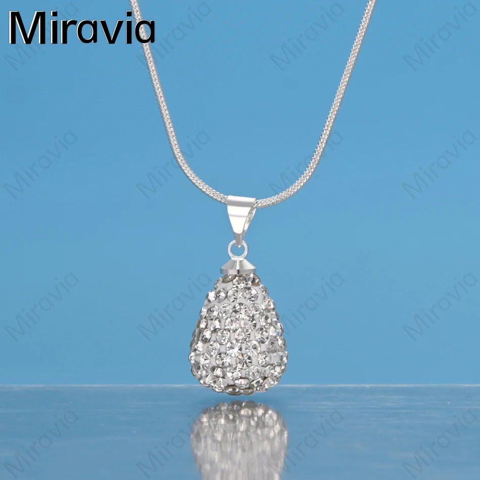 Ожерелье с подвеской в форме капли из стерлингового серебра 925 пробы с цирконием Miravia — свежий и элегантный дизайн для женских ювелирных украшений на помолвку.
Ожерелье с подвеской в форме капли из стерлингового серебра 925 пробы с цирконием Miravia — свежий и элегантный дизайн для женских ювелирных украшений на помолвку.