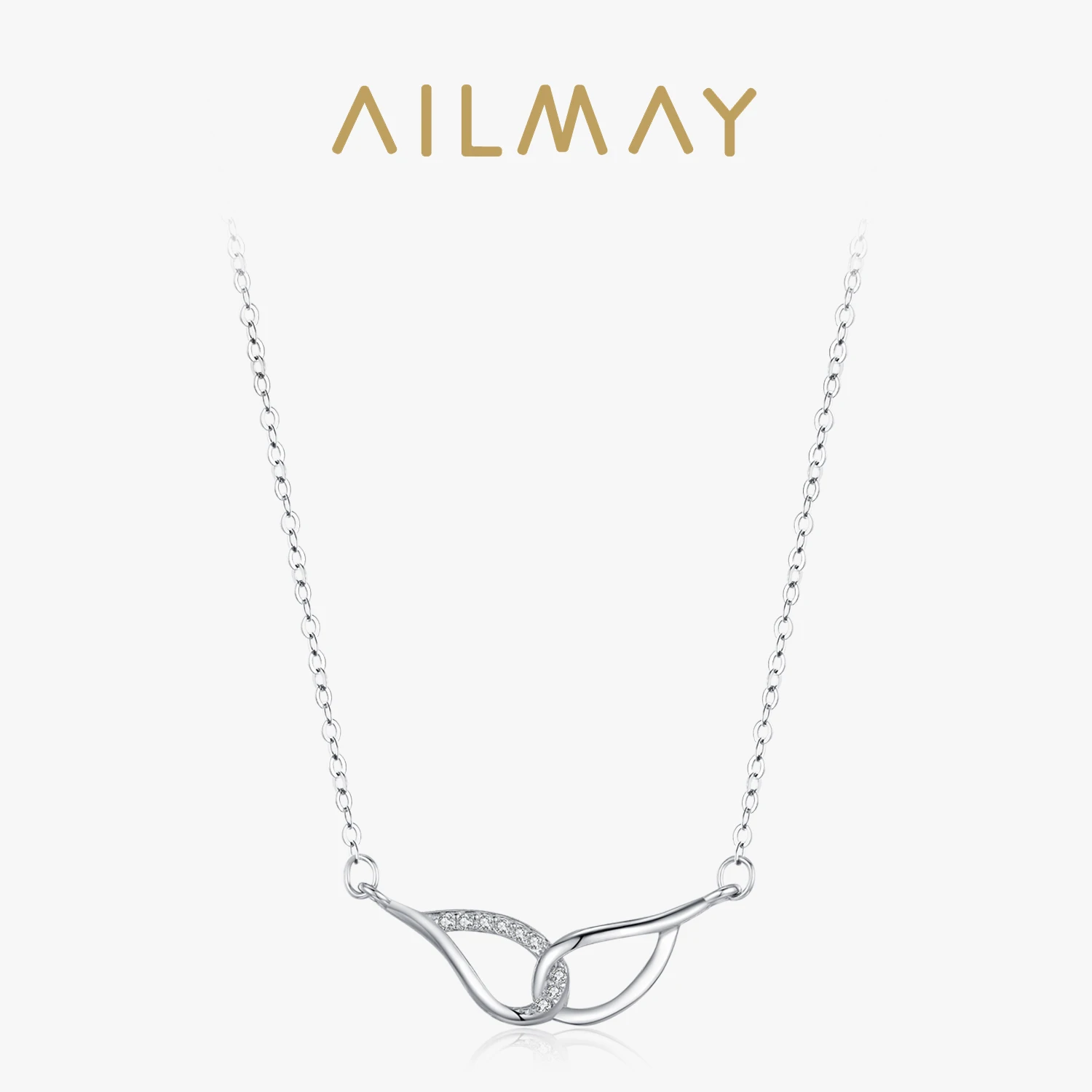 Ailmay стерлингового серебра 925 пробы, элегантное роскошное ожерелье с подвеской в виде крыльев ангела, блестящий циркон для женщин, свадебные и помолвочные ювелирные изделия
Ailmay стерлингового серебра 925 пробы, элегантное роскошное ожерелье с подвеской в виде крыльев ангела, блестящий циркон для женщин, свадебные и помолвочные ювелирные изделия