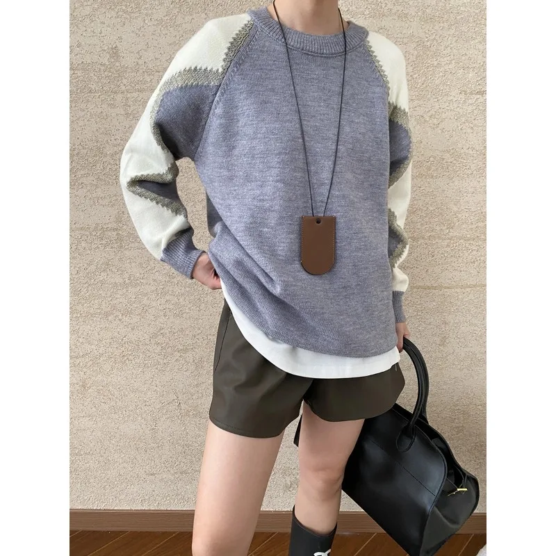 Fashionable and lazy style, retro style stitching and contrasting color round neck loose knitted sweater
Fashionable and lazy style, retro style stitching and contrasting color round neck loose knitted sweater