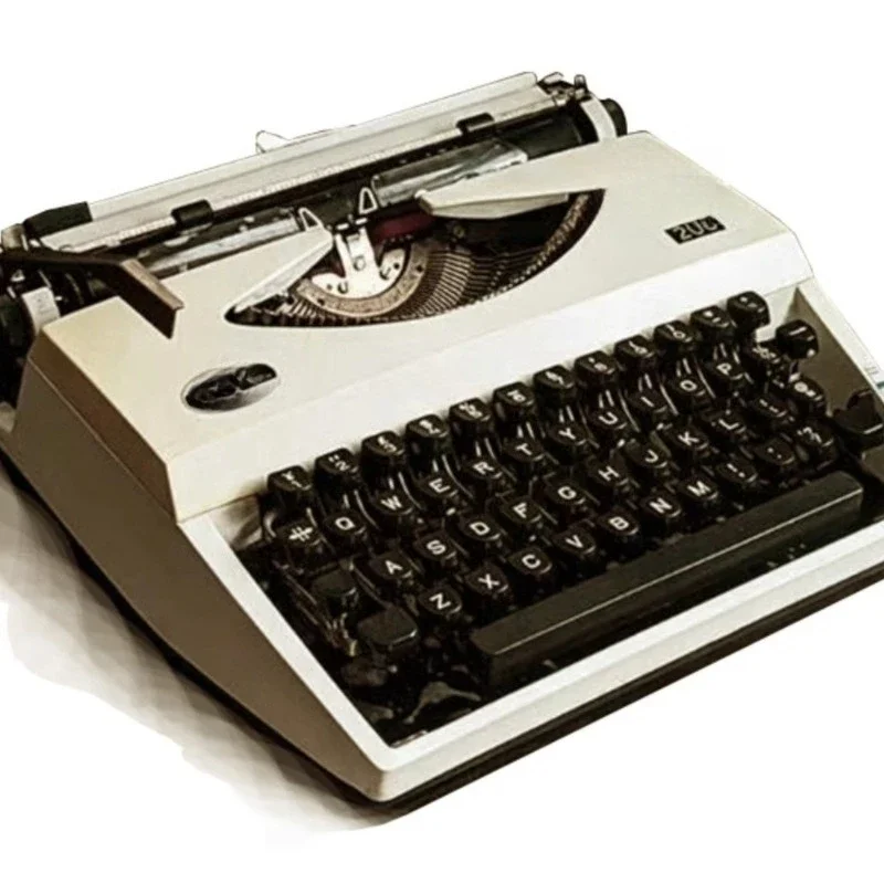 Vintage typewriter, machinery, retro literature and art
Vintage typewriter, machinery, retro literature and art
