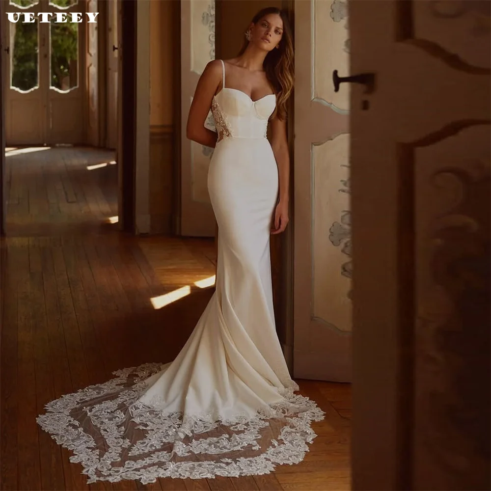 UETEEY Customized Sleeveless Cut Out Appliques Crepe Mermaid Wedding Dress Sexy Illusion Open Back Court Train Bridal Gown
UETEEY Customized Sleeveless Cut Out Appliques Crepe Mermaid Wedding Dress Sexy Illusion Open Back Court Train Bridal Gown
