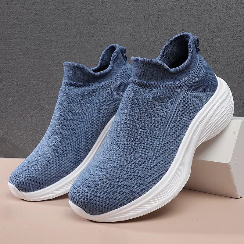 A pair of teens knit slip-on sneakers elastic sock upper lightweight cushioned sole daily walking trainers KM-062
A pair of teens knit slip-on sneakers elastic sock upper lightweight cushioned sole daily walking trainers KM-062