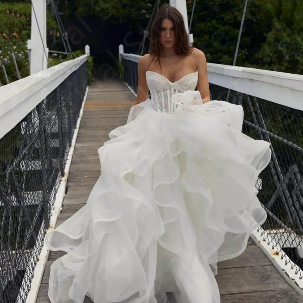 Lovely Ball Gown Wedding Dresses Bridal Gowns Lace Sweetheart Bride Dresses Pearls Sleeveless Wedding Gowns Puffy Bottom
Lovely Ball Gown Wedding Dresses Bridal Gowns Lace Sweetheart Bride Dresses Pearls Sleeveless Wedding Gowns Puffy Bottom