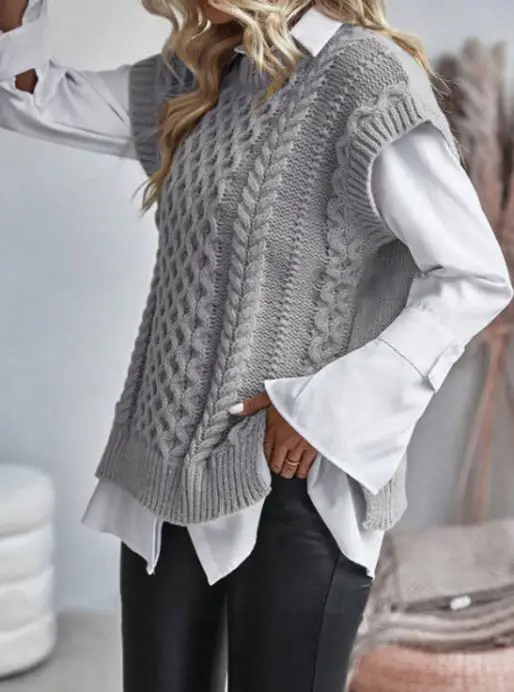 Round Neck Sleeveless Sweater Women's Fried Dough Twists Thread Solid Color Hem Split Vest
Round Neck Sleeveless Sweater Women's Fried Dough Twists Thread Solid Color Hem Split Vest