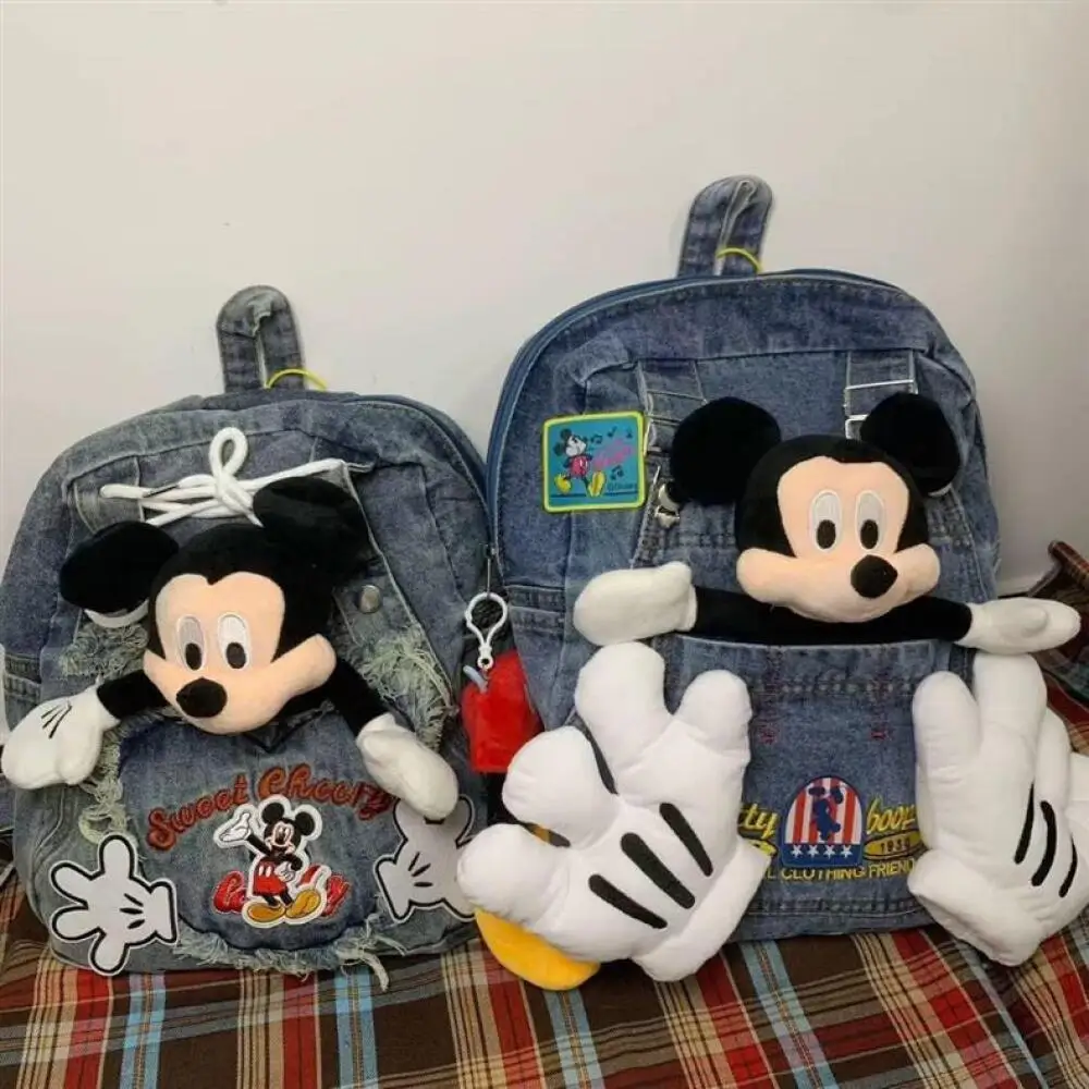 Disney Mickey Mouse Denim Backpack, Vintage Washed Canvas Daypack with 3D Plush Mickey Charm
Disney Mickey Mouse Denim Backpack, Vintage Washed Canvas Daypack with 3D Plush Mickey Charm