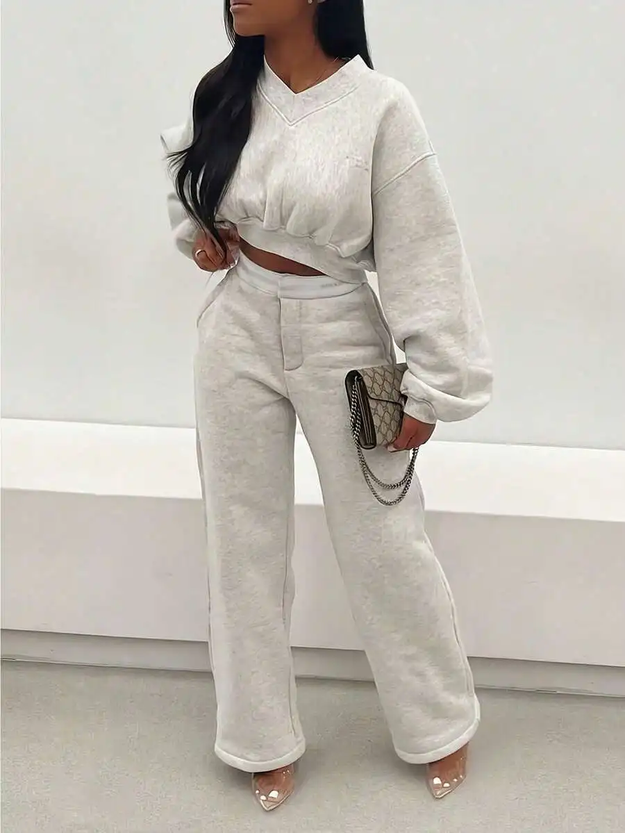Womens Matching Two-Piece Set: V-Neck Cropped Sweatshirt And High-Waisted Wide Leg Joggers
Womens Matching Two-Piece Set: V-Neck Cropped Sweatshirt And High-Waisted Wide Leg Joggers