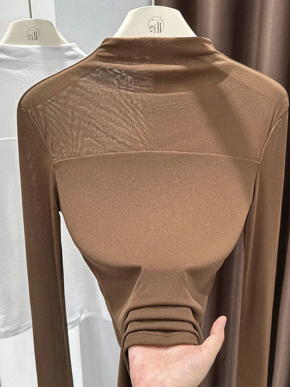 Женская приталенная сетчатая блузка кофейного цвета с кружевным воротником-стойкой, прозрачная, для ношения под пальто, в повседневном стиле
Женская приталенная сетчатая блузка кофейного цвета с кружевным воротником-стойкой, прозрачная, для ношения под пальто, в повседневном стиле