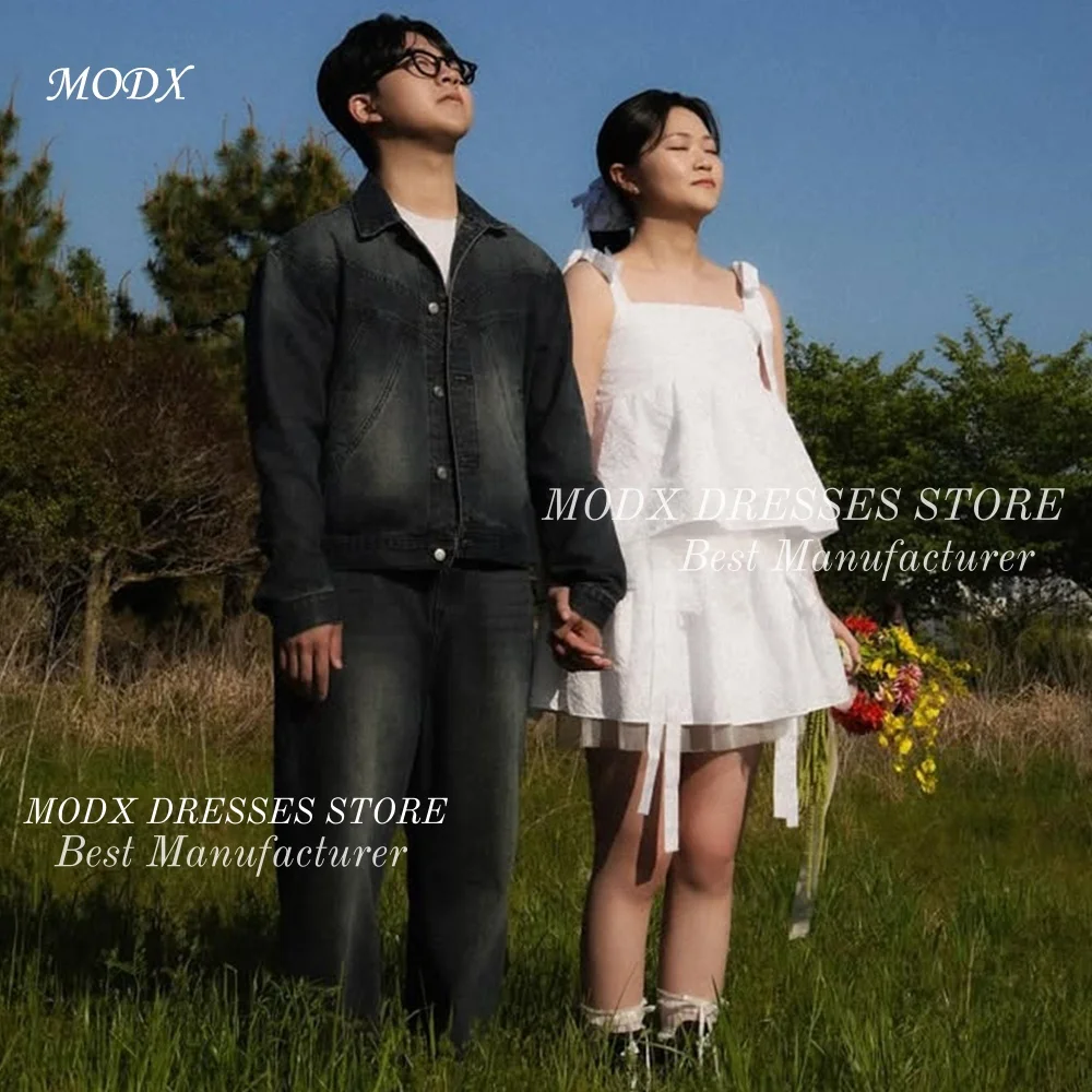 MODX 2026, новое мини-корейское свадебное платье из тафты для фотосессий, короткое свадебное платье Vestidos Novias Boda, женское платье по индивидуальному заказу
MODX 2026, новое мини-корейское свадебное платье из тафты для фотосессий, короткое свадебное платье Vestidos Novias Boda, женское платье по индивидуальному заказу