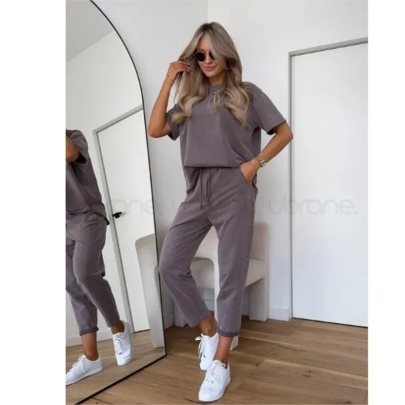 Casual Sports Style 2 Piece Set Women Loose O-neck Short Sleeved Pullover Elastic Waist Lace Up Trousers Set Fashion Commuting
Casual Sports Style 2 Piece Set Women Loose O-neck Short Sleeved Pullover Elastic Waist Lace Up Trousers Set Fashion Commuting