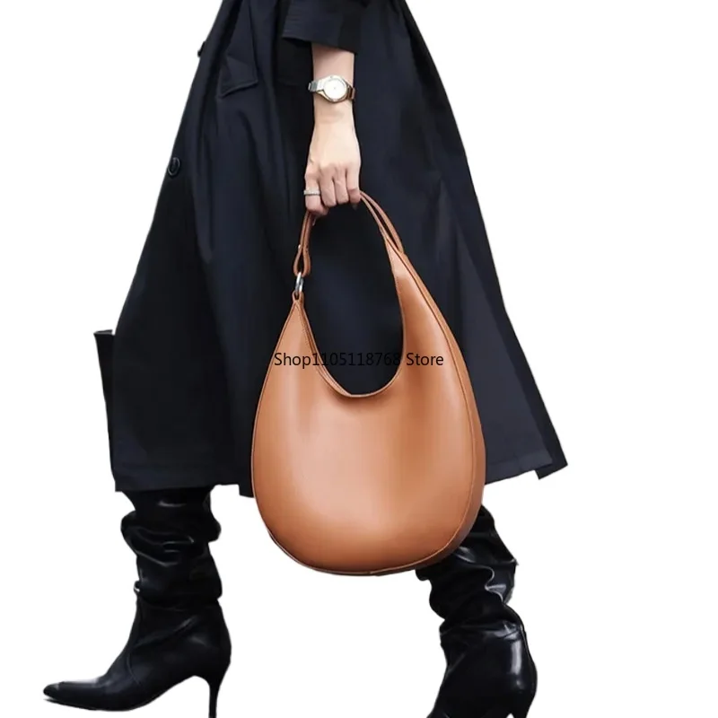 Женская сумка из натуральной кожи, роскошная дизайнерская сумка на плечо, модная сумка в форме полумесяца, женские сумки-тоут из воловьей кожи 
Женская сумка из натуральной кожи, роскошная дизайнерская сумка на плечо, модная сумка в форме полумесяца, женские сумки-тоут из воловьей кожи