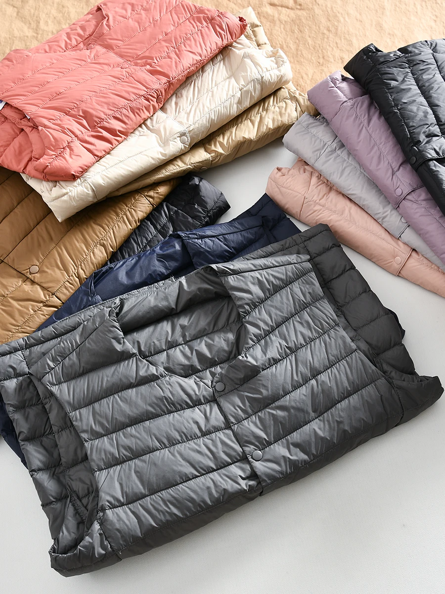 Men's Lightweight Warm Duck down Vest Pure Color Fashion Urban Style Business Casual round Neck Buttoned Closure Nylon Fabric
Men's Lightweight Warm Duck down Vest Pure Color Fashion Urban Style Business Casual round Neck Buttoned Closure Nylon Fabric