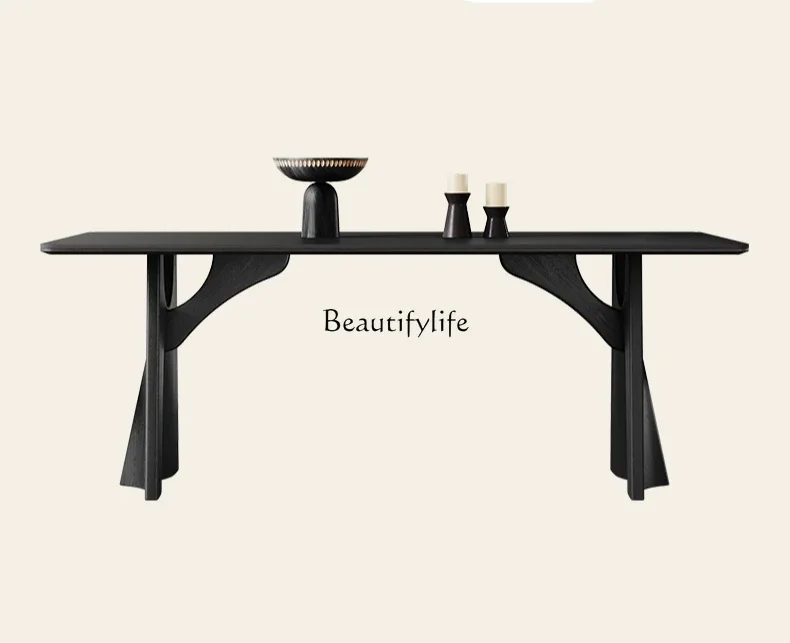 Retro black rock slab dining table Modern simple French wabi-sabi solid wood dining table
Retro black rock slab dining table Modern simple French wabi-sabi solid wood dining table