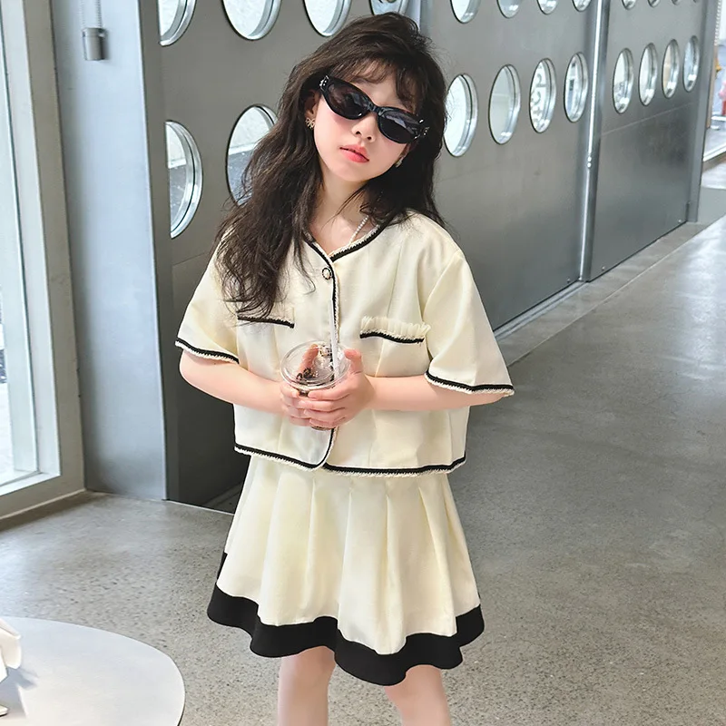 French Girls Fashion Short sleeved coat Pleated Skirt 2pcs 4-14 kids Skirt Set childer clothes suit vetement enfant fille outfit
French Girls Fashion Short sleeved coat Pleated Skirt 2pcs 4-14 kids Skirt Set childer clothes suit vetement enfant fille outfit