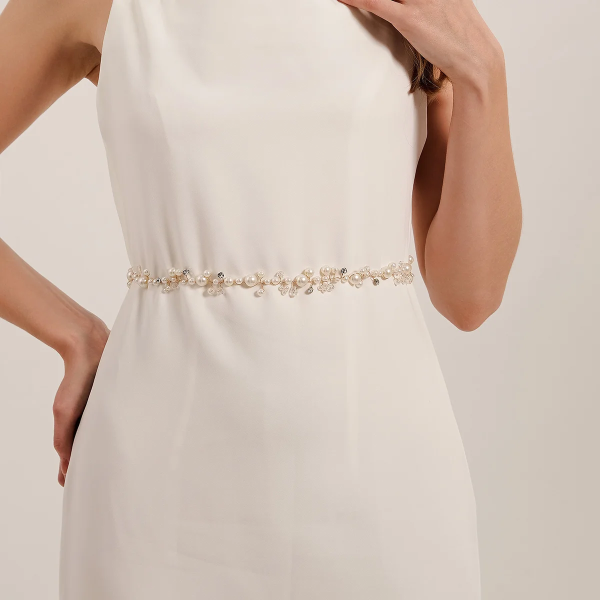 Европейский и американский золотой роскошный пояс ручной работы с жемчугом и бисером, модное свадебное платье с кристаллами, цепочка на талию, аксессуары в качестве подарков
Европейский и американский золотой роскошный пояс ручной работы с жемчугом и бисером, модное свадебное платье с кристаллами, цепочка на талию, аксессуары в качестве подарков