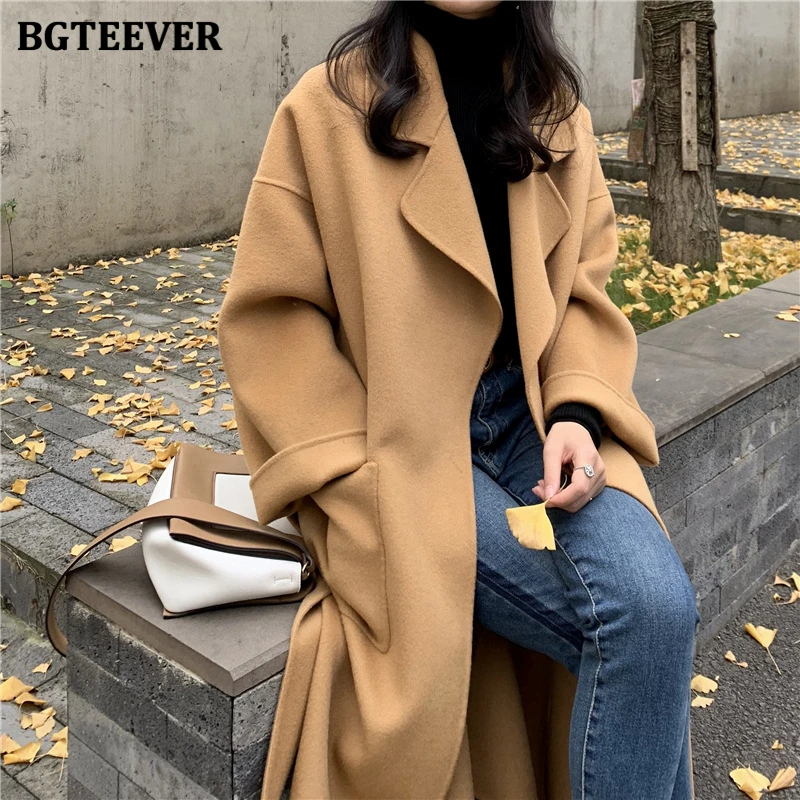 BGTEEVER Warm 100% Wool Coat Women Turn-down Collar Winter Women Cashmere Long Overcoats With Belt Tops Abrigo Mujer
BGTEEVER Warm 100% Wool Coat Women Turn-down Collar Winter Women Cashmere Long Overcoats With Belt Tops Abrigo Mujer