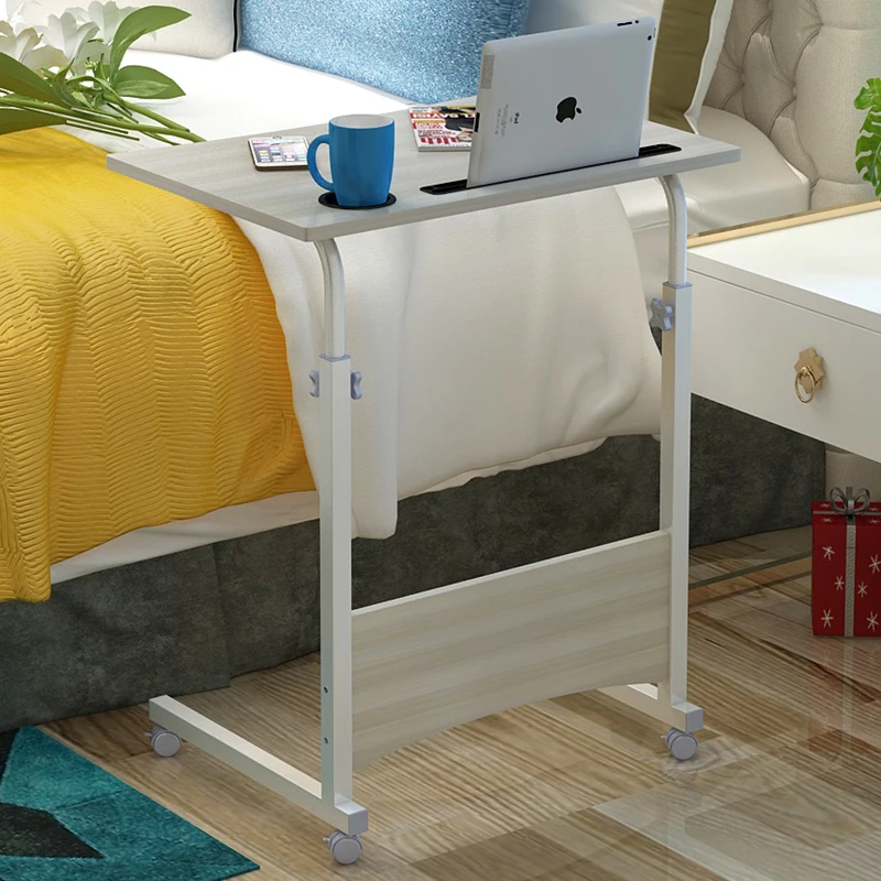 Movable lifting laptop computer table by the bed, folding desk on the bed, simple dormitory floor-to-ceiling lazy small table
Movable lifting laptop computer table by the bed, folding desk on the bed, simple dormitory floor-to-ceiling lazy small table