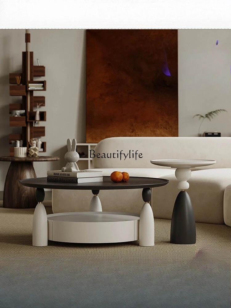 Cream wind coffee table simple modern small apartment light luxury round combination
Cream wind coffee table simple modern small apartment light luxury round combination