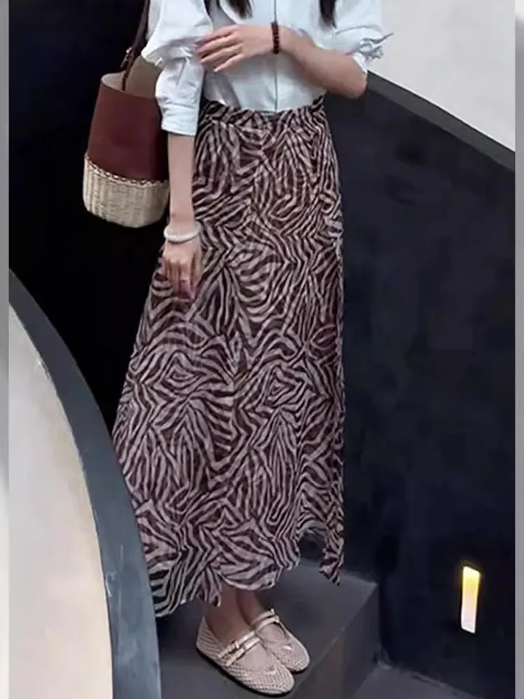 Новая летняя юбка женская шифоновая юбка из ледяного шелка нерегулярной формы с высокой талией трапециевидной формы модные повседневные юбки миди с принтом элегантные офисные женские юбки 
Новая летняя юбка женская шифоновая юбка из ледяного шелка нерегулярной формы с высокой талией трапециевидной формы модные повседневные юбки миди с принтом элегантные офисные женские юбки