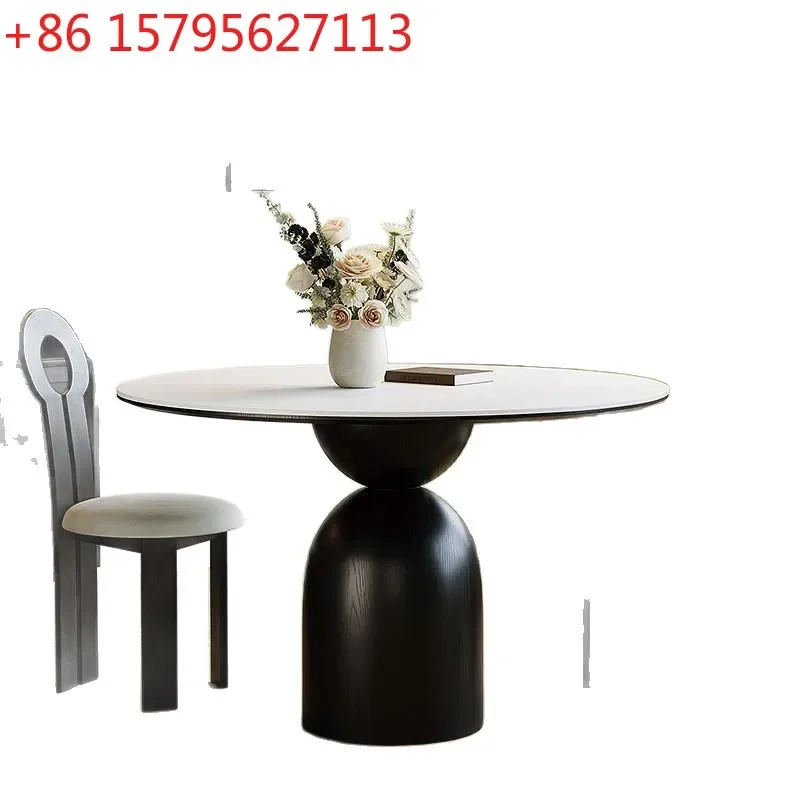 Modern simple and retro wind rock slab solid wood dining table and chair combination household round Nordic dining table
Modern simple and retro wind rock slab solid wood dining table and chair combination household round Nordic dining table
