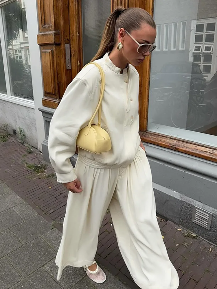 Casual White Stand Neck Jacket Suits Fashion Long Sleeve Single Breasted Loose Wide Leg Pants Set 2025 Autumn Lady Office Outfit
Casual White Stand Neck Jacket Suits Fashion Long Sleeve Single Breasted Loose Wide Leg Pants Set 2025 Autumn Lady Office Outfit