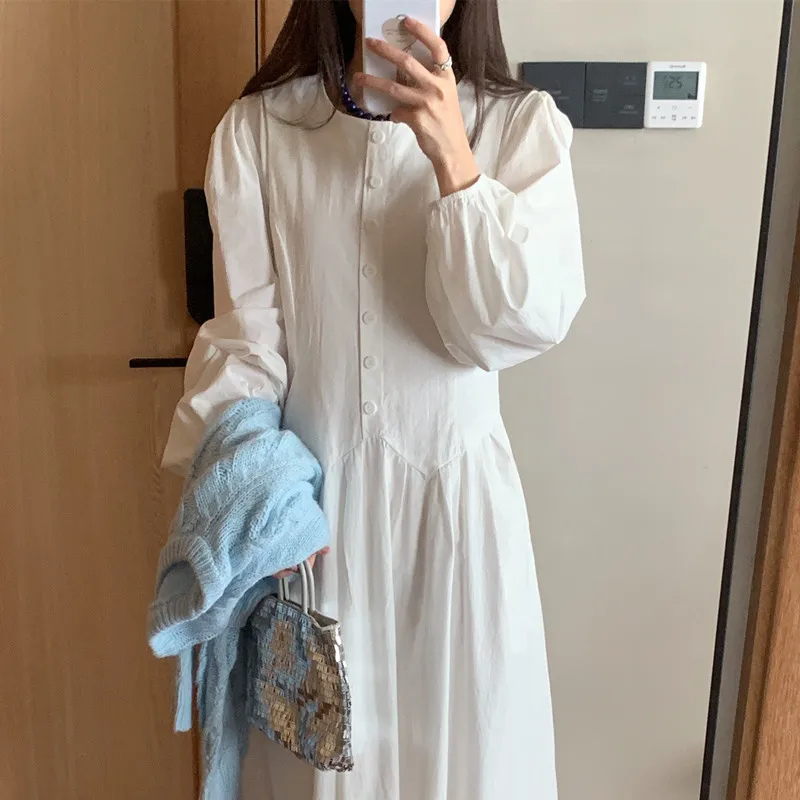 Женское осеннее винтажное платье с круглым вырезом, на одной пуговице, приталенное, с плиссированными вставками и рукавами-фонариками, с длинными рукавами
Женское осеннее винтажное платье с круглым вырезом, на одной пуговице, приталенное, с плиссированными вставками и рукавами-фонариками, с длинными рукавами