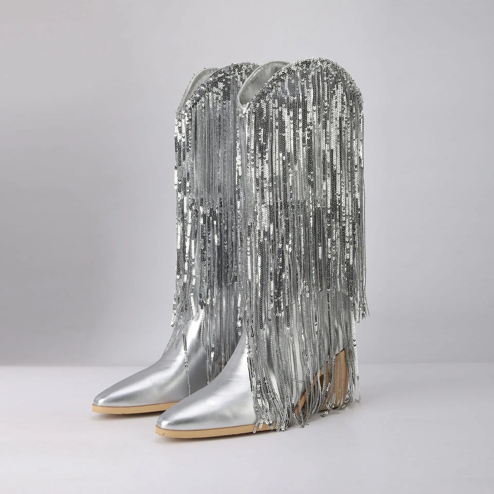 European and American New Sequin Tassel Pointed Thick Heel High Heel Sleeve Knee High Sleeve Boots Large Size Long Boots Female
European and American New Sequin Tassel Pointed Thick Heel High Heel Sleeve Knee High Sleeve Boots Large Size Long Boots Female