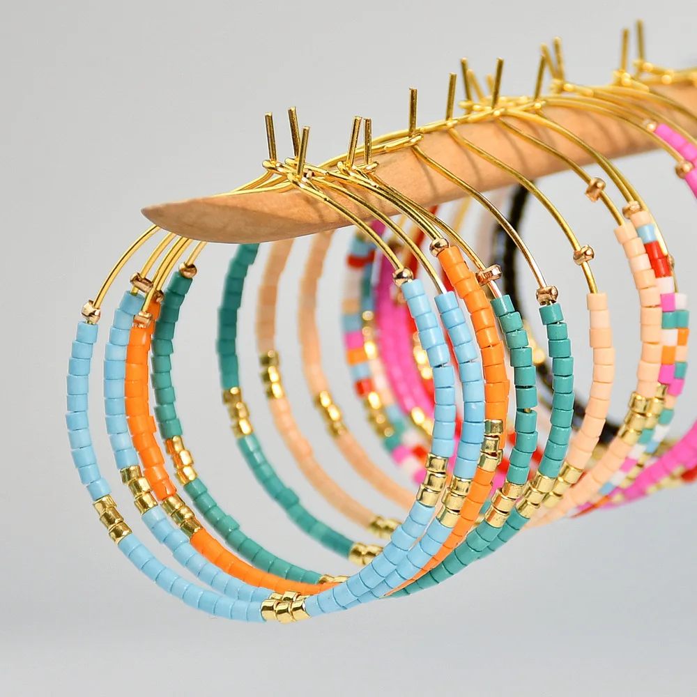 Beaded earrings Circle Originality Chroma Hand knitting Alloy Female Bohemia Tide Simple Rice bead earrings
Beaded earrings Circle Originality Chroma Hand knitting Alloy Female Bohemia Tide Simple Rice bead earrings