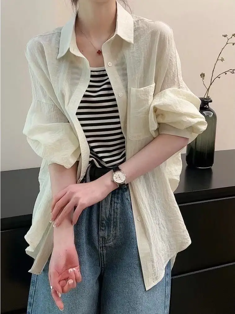 Summer Women's Casual Long Sleeve Pure Color Collar Sun Protection Shirt Fashionable Open Cardigan Top Korean Style Loose Fit
Summer Women's Casual Long Sleeve Pure Color Collar Sun Protection Shirt Fashionable Open Cardigan Top Korean Style Loose Fit