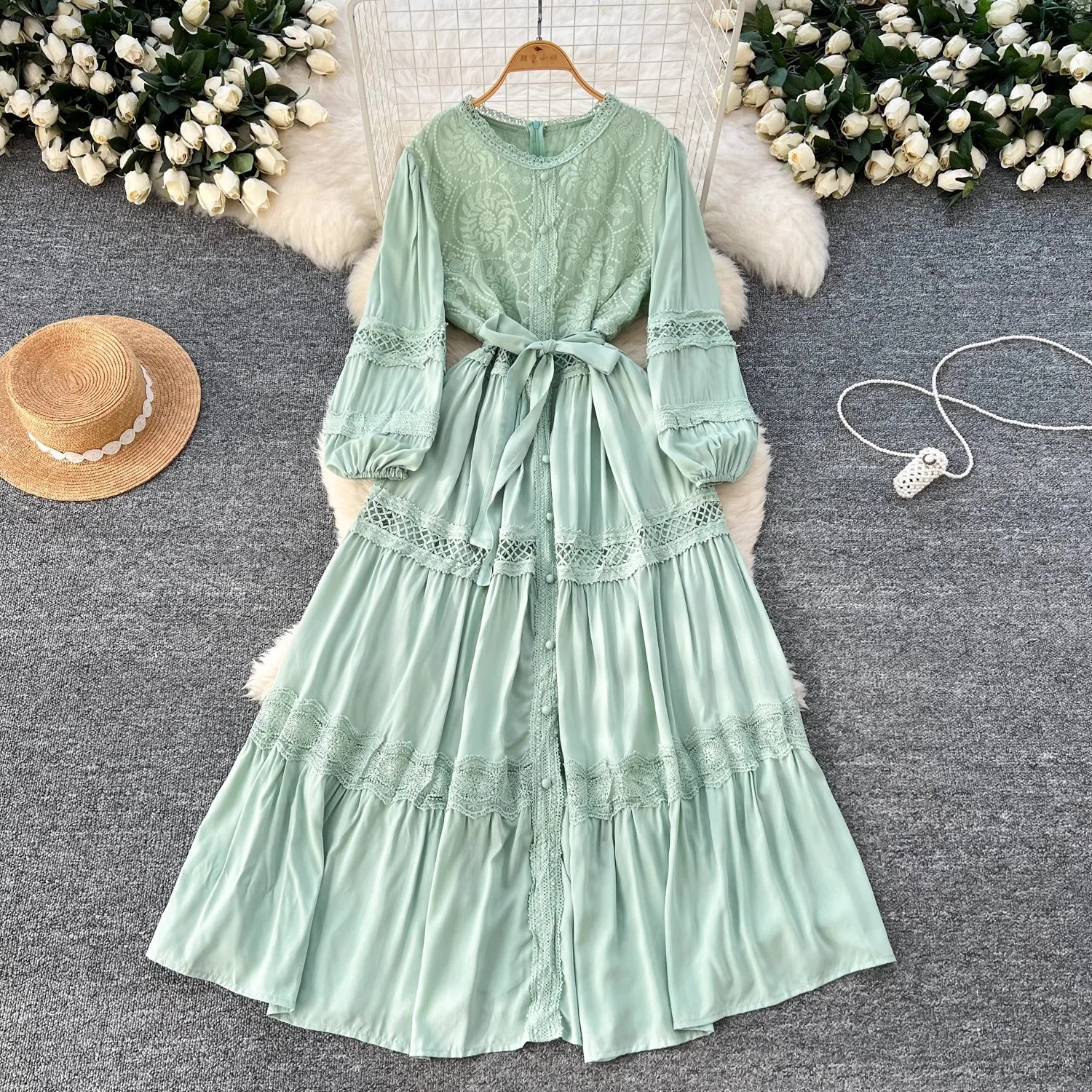 2025 New Lace Stitching Embroidery Dress French Belt Waist Lantern Sleeve Single-breasted Long Beach Dress Female Vestidos
2025 New Lace Stitching Embroidery Dress French Belt Waist Lantern Sleeve Single-breasted Long Beach Dress Female Vestidos